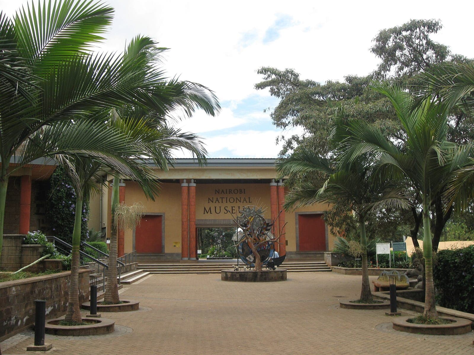 Entrance courtyard of the Nairobi National Museum with palm trees